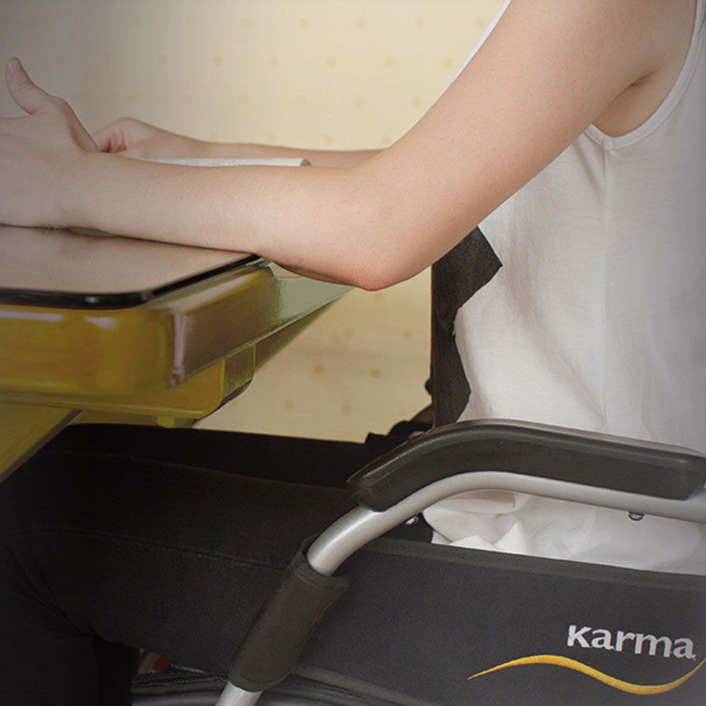 Karma Ergo Lite - Armrests designed to allow you to get up to desks and tables