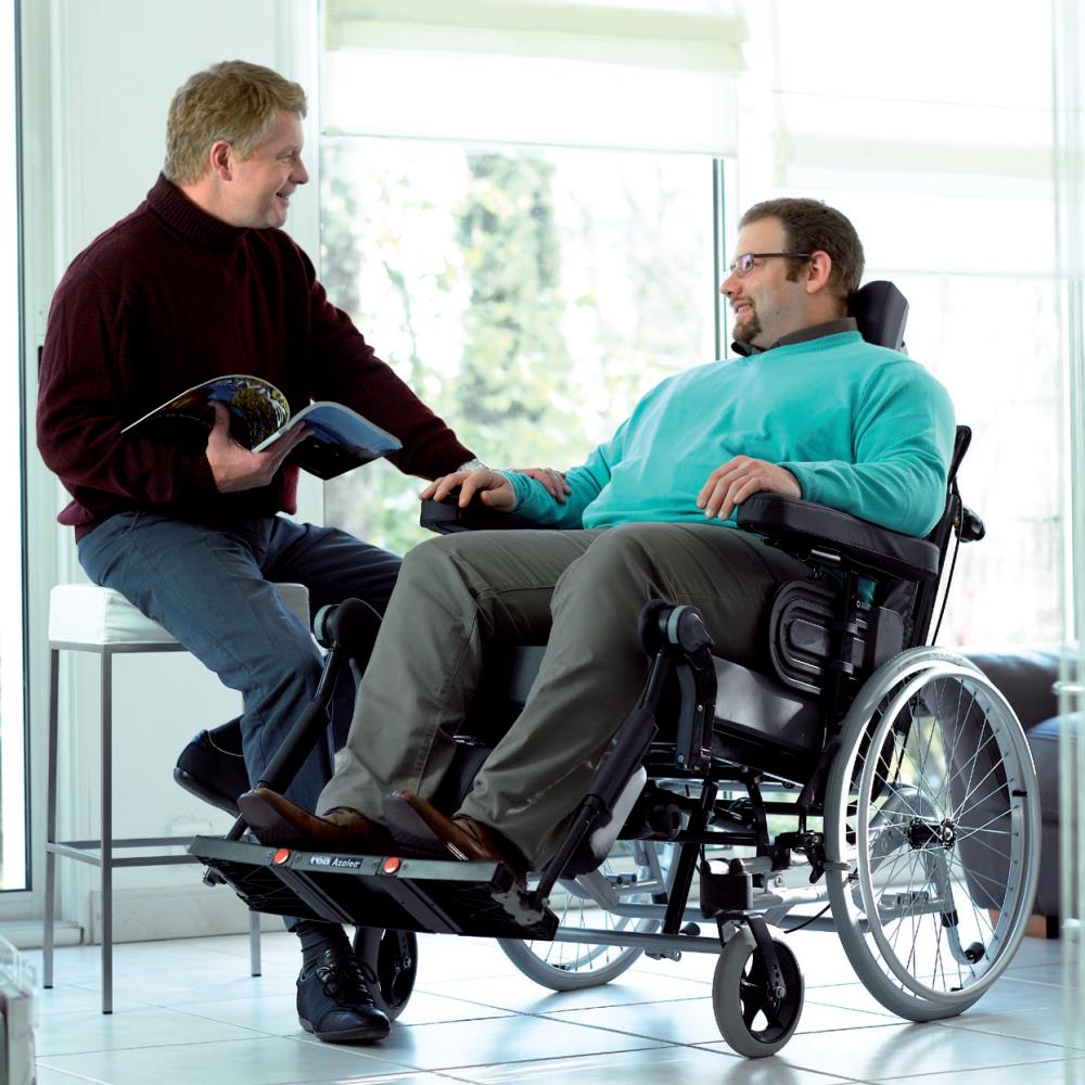 Invacare Rea Azalea Max - Man Sitting On Wheelchair.