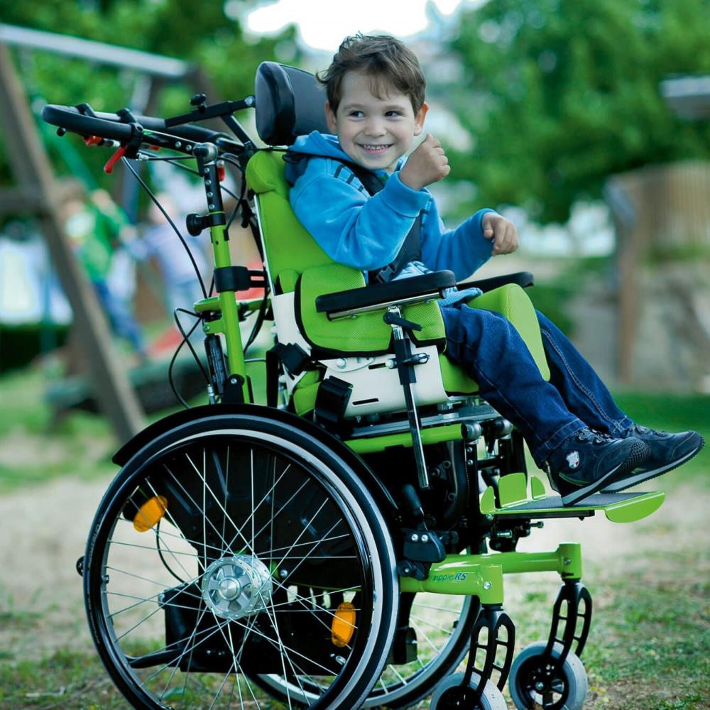 Zippie RS Tilt In Space Wheelchair - Boy smiling on wheelchair.