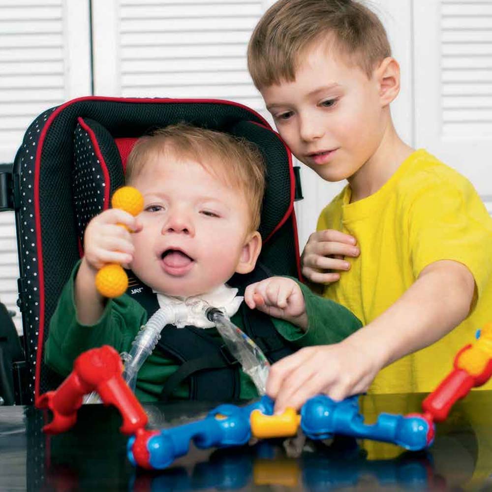Zippie Voyage Early Intervention Stroller - Playing with big brother.
